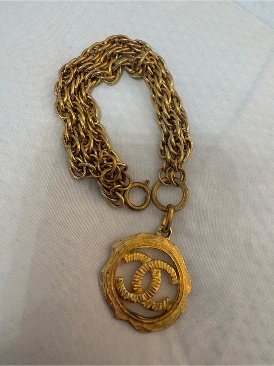 CHANEL Jewelry - Chanel Gold-Tone Interlocking Pendant bracelet
